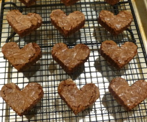 Heart Shaped Brownies Filled with Cream Cheese Frosting and Covered in Ganache for Valentine's Day