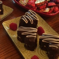 Heart Shaped Brownies Filled with Cream Cheese Frosting and Covered in Ganache for Valentine's Day