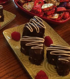 Heart Shaped Brownies Filled with Cream Cheese Frosting and Covered in Ganache for Valentine's Day